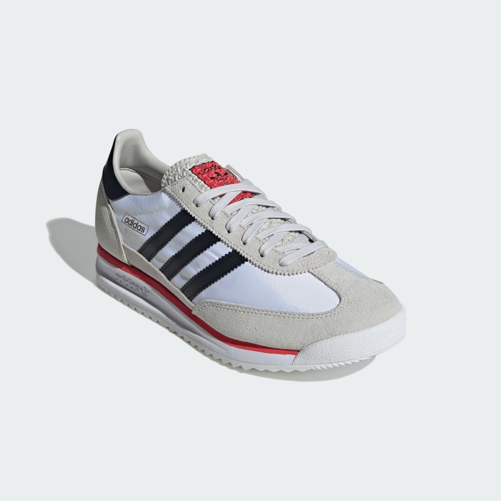 Adidas Classic White and Black Sneakers with Red Highlights